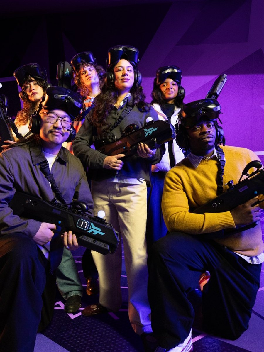 Friends celebrating a birthday at an immersive entertainment venue
